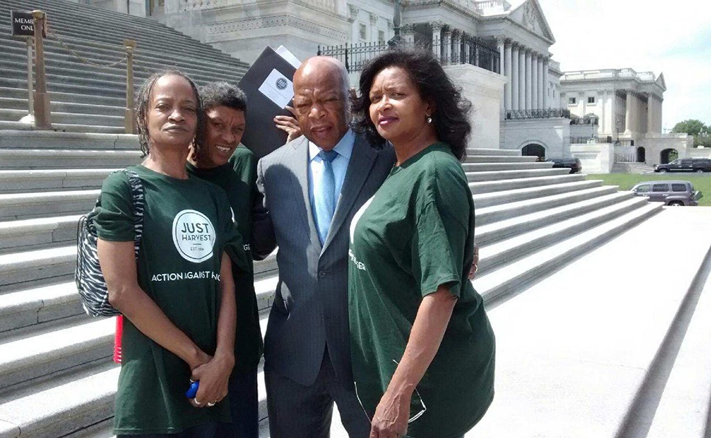 Three Just Harvest clients with Rep. John Lewis on a June 2015 lobbying trip to protect SNAP/food stamp funding