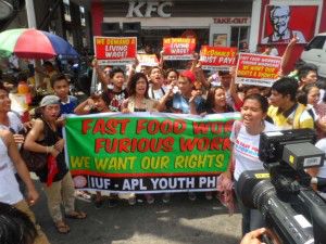 Fast food workers in Manila protest on May 15. 