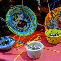 Pittsburgh Gifted Students' ceramic bowls under their Helping Hands holiday tree