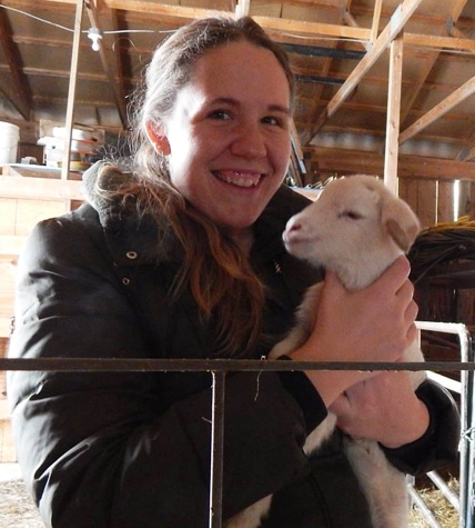 Heritage Farm's Tara Lynne Burns with lamb