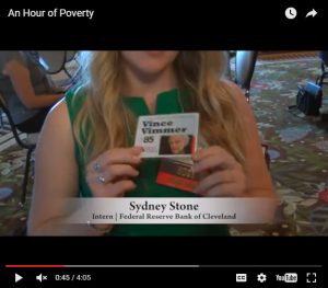 Federal Reserve Bank of Cleveland intern Sydney Stone talks about the struggles of her character in a recent Just Harvest poverty simulation.