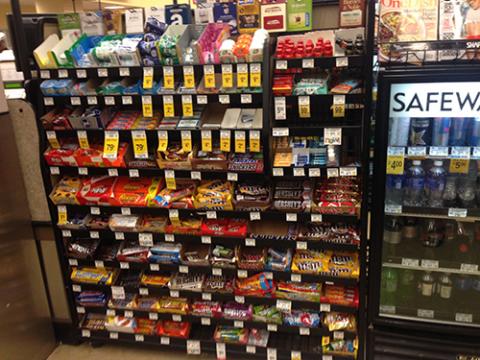 candy display and soda cooler in store, items possibly subject to new food stamp junk food ban