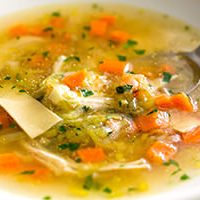 chicken noodle soup (via Andrew Scrivani for The New York Times)